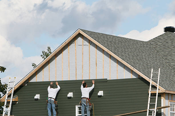 Professional Siding Contractor technician working in Weaverville, NC